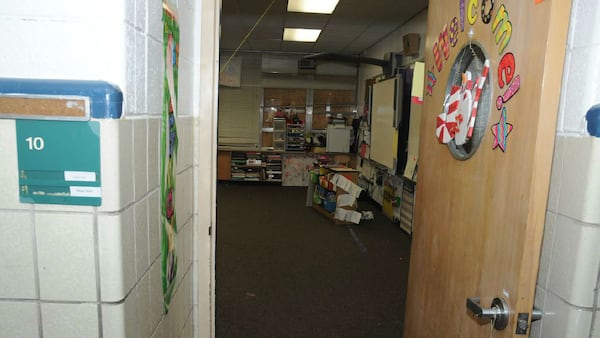 Pictured is the doorway at Sandy Hook Elementary School leading to first grade teacher Victoria Soto's classroom, where Soto, five of her 15 students and teacher's aide Anne Marie Murphy were gunned down Dec. 14, 2012, by 20-year-old Adam Lanza. Soto was hailed a hero for saving 10 of her students by hiding them in closets and cabinets and putting herself between them and the gunman. Documents from the investigation into the Sandy Hook shooting are shedding light on Lanza’s anger, scorn for other people and deep social isolation in the years leading up to the shooting. He fatally shot his mother, Nancy Lanza, at their home before driving to the school, where he killed 20 children and six educators before killing himself.