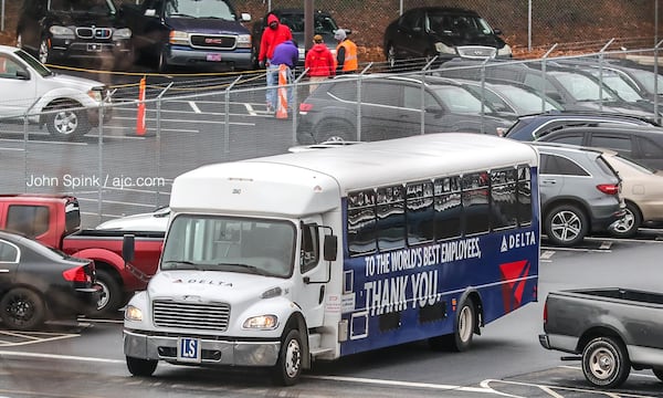 Delta employees typically shuttle from the parking lot off Camp Creek Parkway to Hartsfield-Jackson International Airport.