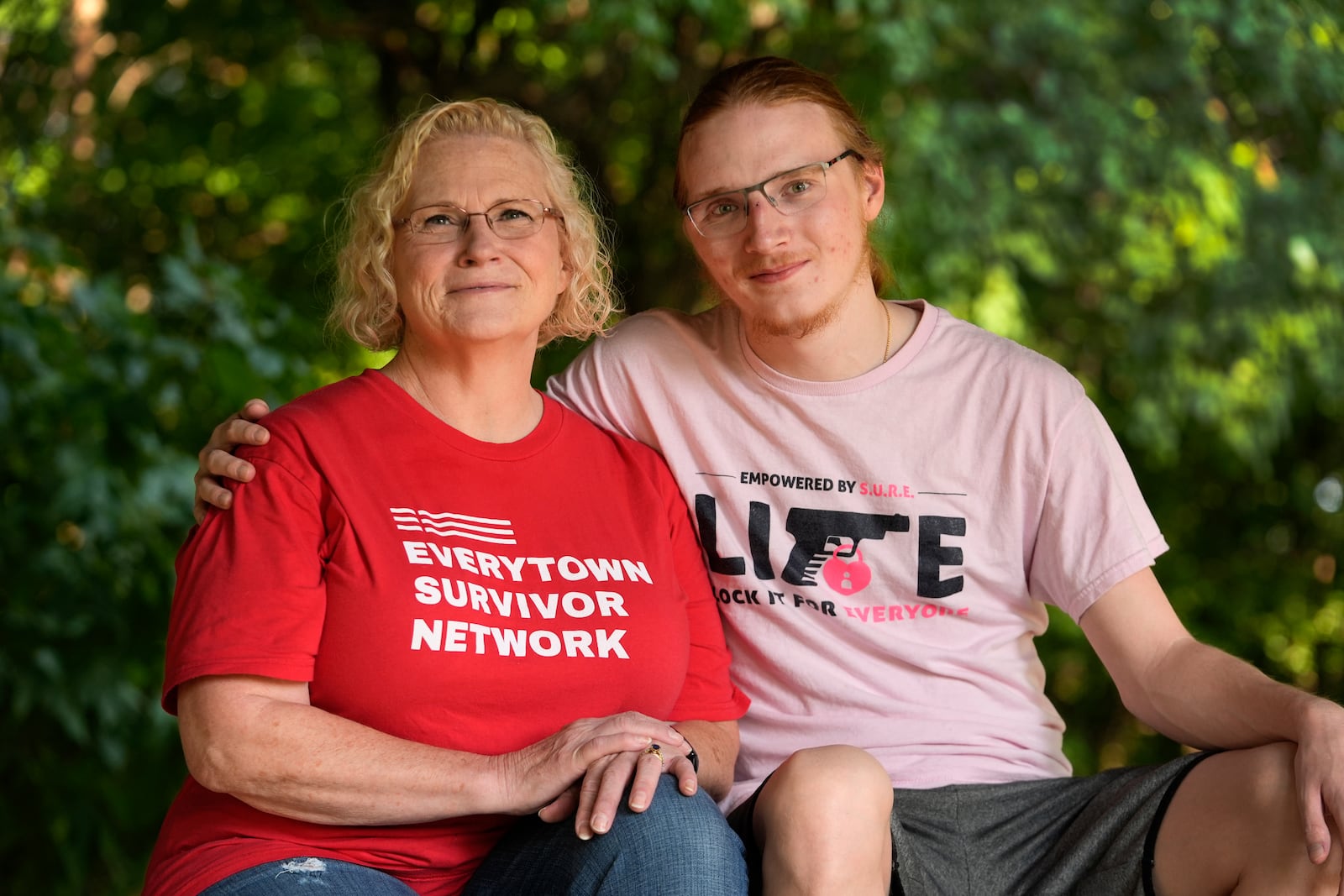 Denise Wieck and her son Guy Boyd, who was shot in the eye with a ghost gun, pose in Ypsilanti, Mich., Saturday, Sept. 14, 2024. (AP Photo/Paul Sancya)