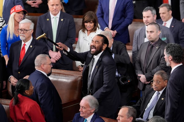 U.S. Rep. Al Green, a Democrat from Texas, disrupted President Donald Trump as he addressed a joint session of Congress at the Capitol in Washington on Tuesday.