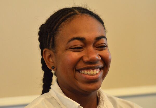  Kendra Gray, 24, smiles just minutes after hearing her father Anthony Gray would be released from prison after more than 15 years behind bars.  (Photo Chris Hunt/Special)