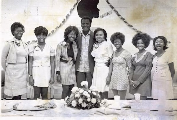 Sidney Poitier visits the campus of Middle Tennessee State University in Murfreesboro, Tenn., and poses with Constance Walker (second from R) and fellow charter members of the school's Eta Psi chapter of Alpha Kappa Alpha.