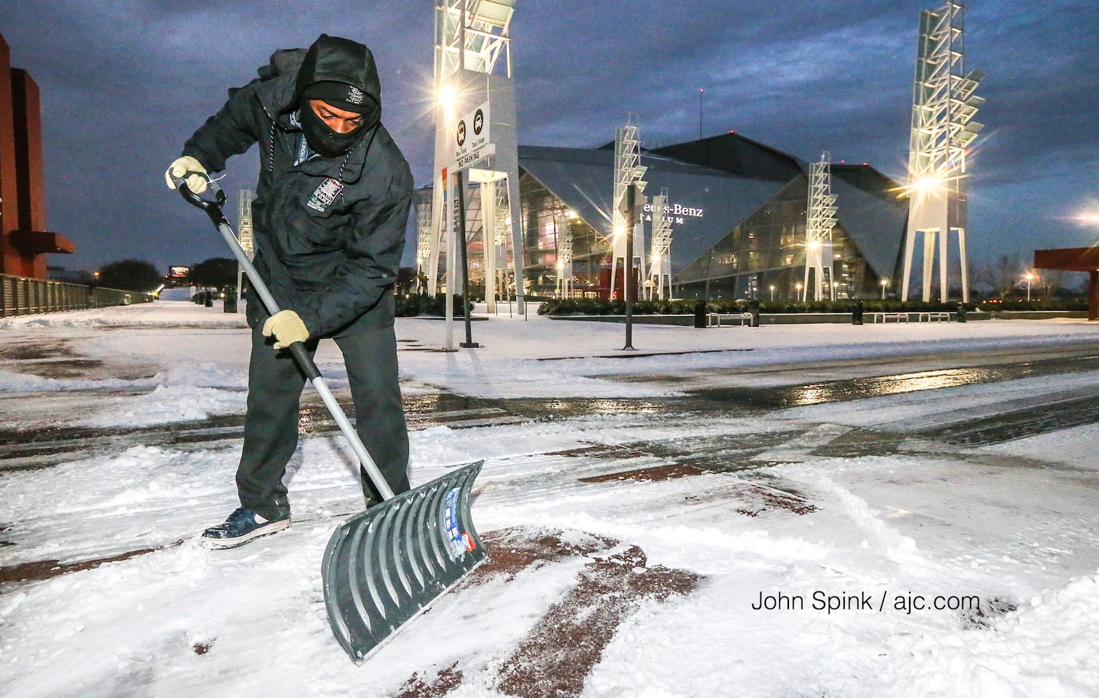 Photos: Frigid cold and snow move in to metro Atlanta