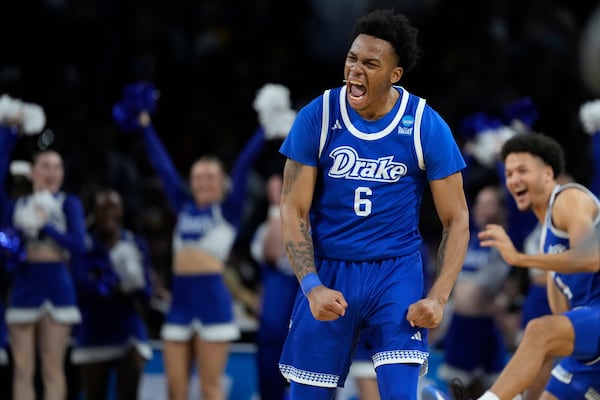 Drake guard Tavion Banks (6) celebrates after making a basket during the second half of a game against Missouri in the first round of the NCAA college basketball tournament, Thursday, March 20, 2025, in Wichita, Kan. (AP Photo/Charlie Riedel)