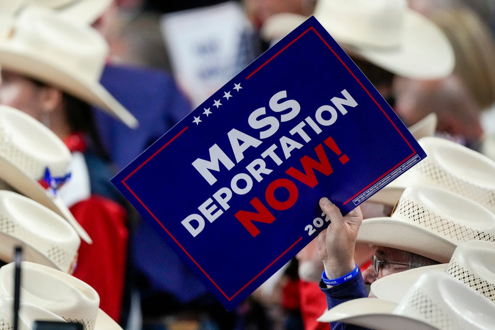 FILE - A member of the Texas delegation holds a sign during the Republican National Convention on July 17, 2024, in Milwaukee. (AP Photo/Matt Rourke, File)