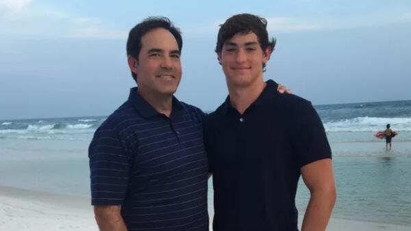 Brad Howard (left) went to his son's (right) classroom after his son received multiple warnings to be quiet in his physics class.