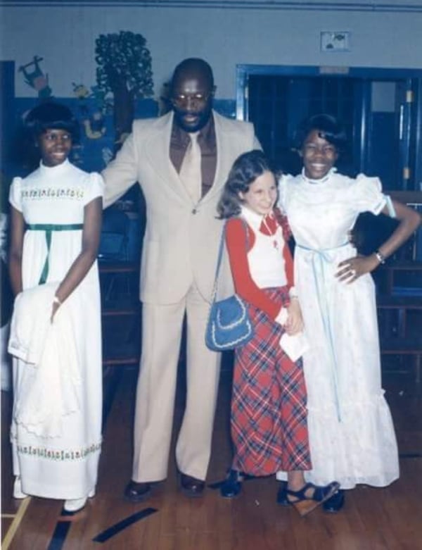 Isaac Hayes (middle), along with his daughters Felecia and Veronica in the white dresses, attend a father-daughter dance in Memphis in 1976. Days later, the daughters would meet The Jackson 5 for the first time.