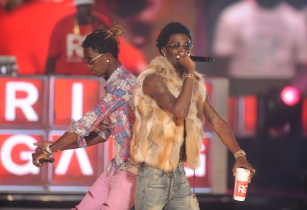 ATLANTA, GA - SEPTEMBER 20: Rappers Young Thug (L) and Rich Homie Quan perform onstage during the BET Hip Hop Awards 2014 at Boisfeuillet Jones Atlanta Civic Center on September 20, 2014 in Atlanta, Georgia. (Photo by Brad Barket/BET/Getty Images for BET)