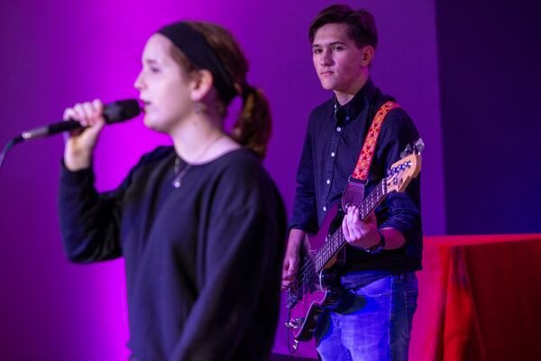 Samantha Clark and Jackson Warren practice with fellow Eclipse band members at the Music Authority in Cumming.PHIL SKINNER FOR THE ATLANTA JOURNAL-CONSTITUTION.