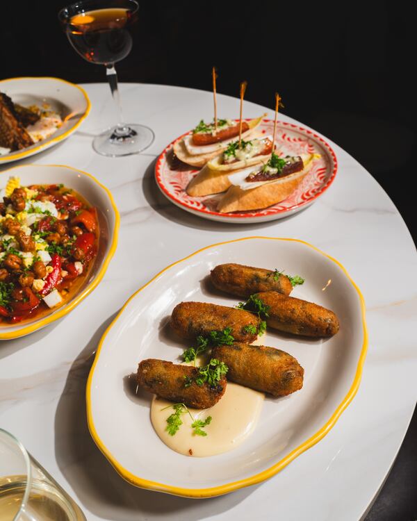 You can get classic tapas dishes, such as croquetas de jamon, along with pintxos bar snacks at La Metro. (Courtesy of the Imprints)