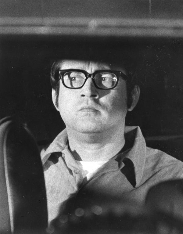 William A.H. Williams, shown in police custody on Aug. 5, 1974, called the AJC on the 40th anniversary of the day he abducted former Constitution editor Reg Murphy. Williams was in Las Vegas and battling cancer.