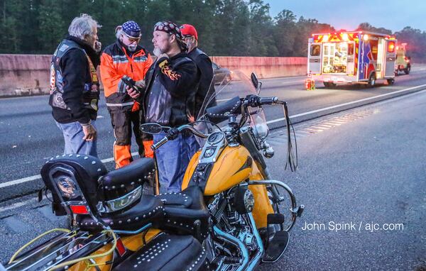 A crash injured two Honor Flight escorts on I-20 early Wednesday. JOHN SPINK / JSPINK@AJC.COM