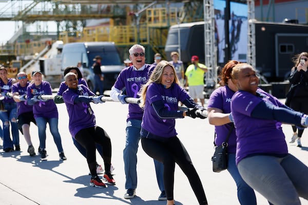 Delta CEO Ed Bastian (center) participated in the event with the "Hope Thrives" team during the Delta Jet Drag fundraising event to benefit the American Cancer Society on Wednesday, May 3, 2023.
Miguel Martinez /miguel.martinezjimenez@ajc.com