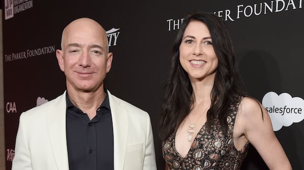 Chief Executive Officer of Amazon Jeff Bezos (L) and MacKenzie Bezos have finalized their divorce.