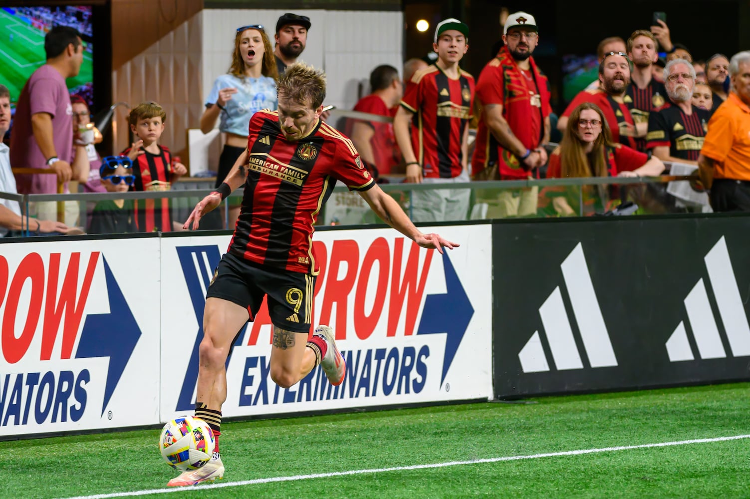 Saba Lobjanidze attempts to keep the ball in play during the Atlanta United game against Columbus Crew at Mercedes Benz Stadium in Atlanta, GA on July 20, 2024. (Jamie Spaar for the Atlanta Journal Constitution)