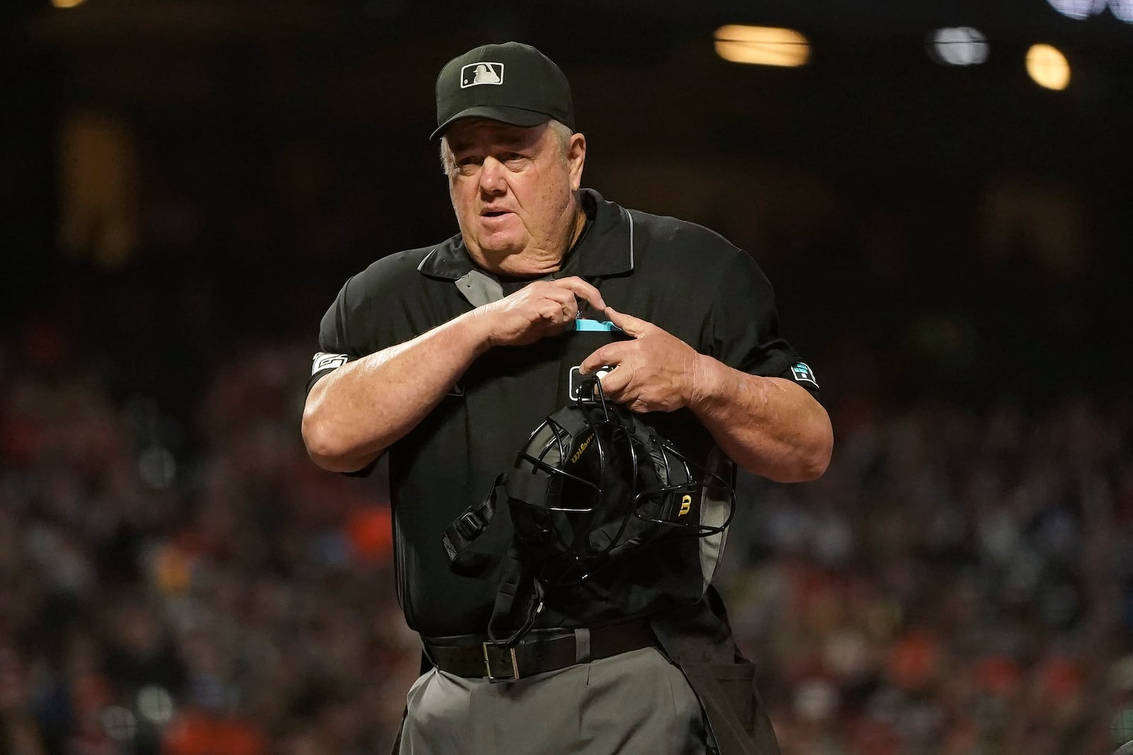 FILE - Umpire Joe West during a baseball game between the San Francisco Giants and the San Diego Padres in San Francisco, Oct. 1, 2021. (AP Photo/Jeff Chiu, File)