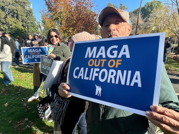 Immigration advocates hold a rally in Sacramento, Calif. on Monday, Dec. 2, 2024, to protest President-Elect Donald Trump's plans to conduct mass deportation of immigrants without legal status. (AP Photo/Haven Daley)