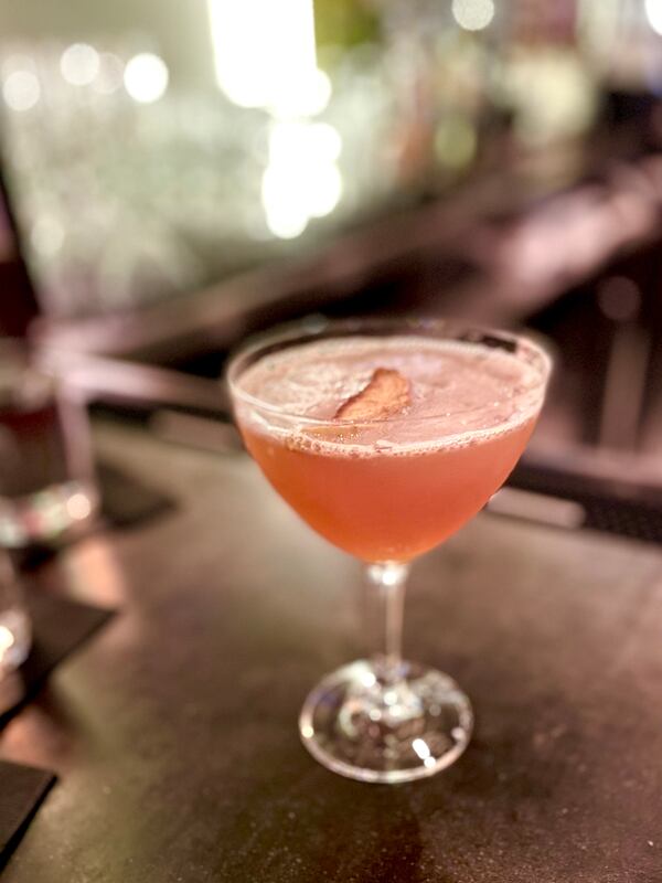 Bartender Morgan Wagoner of the Deer and the Dove created Saturday Night Kind of Pink, a mezcal-infused drink that is intriguing for its brightness, balance and smoky notes. Angela Hansberger for The Atlanta Journal-Constitution