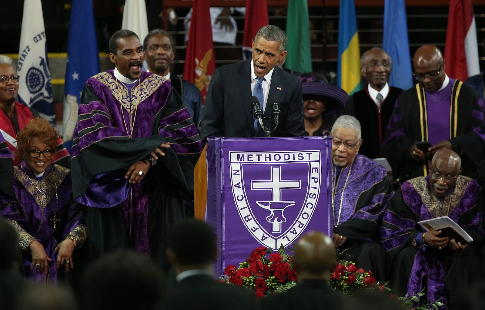 President Barack Obama sings “Amazing Grace” while delivering the eulogy for the Rev. Clementa Pinckney, who was also a South Carolina state senator, during Pinckney’s funeral service June 26, 2015, in Charleston, S.C. Pinckney was one of nine people killed June 17 during a prayer meeting in the church, which is one of the nation’s oldest black churches. WIN MCNAMEE / GETTY IMAGES