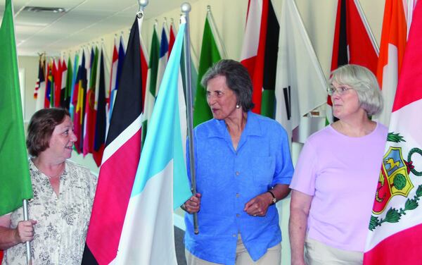 Former Lilburn mayor Diana Preston (center) chatted with Elaine Brown (l) from First Baptist Church of Lilburn and Margot Ashley or SafetySmart Lilburn about the city's first international festival in this file photo.