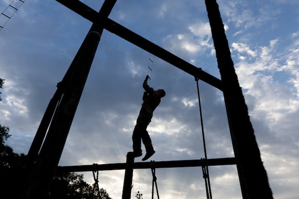 Maj. Jack Gibson completes obstacle course training at Fort Moore in Columbus. His late grandfather, Jim Shalala, volunteered for the 2nd Ranger Battalion, an elite Army unit that was organized at Camp Forrest near Tullahoma, Tennessee. (Arvin Temkar / AJC)