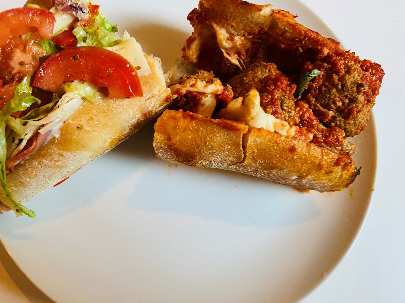 The Goodfella sandwich (left) and meatball Parmesan sandwich are new at Varuni Napoli on Krog Street. CONTRIBUTED BY BOB TOWNSEND