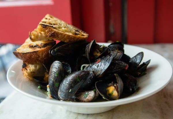 This antipasto course at Bar Americano consists of spicy mussels, Calabrese chiles, garlic, white wine and oregano. CONTRIBUTED BY HENRI HOLLIS