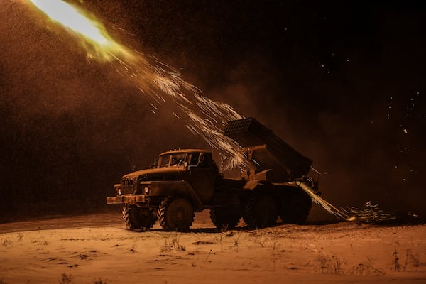 In this photo provided by Ukraine's 24th Mechanized Brigade press service, an MRLS BM-21 "Grad" fires towards Russian army positions near Chasiv Yar, Donetsk region, Ukraine, Sunday, Feb. 23, 2025. (Oleg Petrasiuk/Ukraine's 24th Mechanized Brigade via AP)