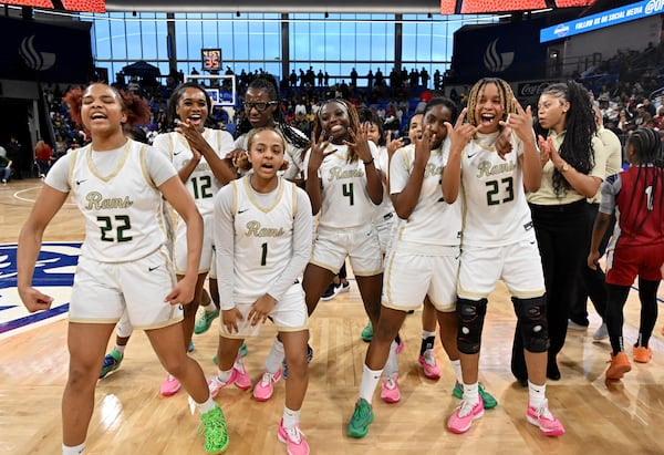 Grayson players celebrate their victory over Lowndes during GHSA Class 7A Semifinal  basketball game at GSU’s Convocation Center, Saturday, Mar. 2, 2024, in Atlanta. Grayson won 66-25 over Lowndes. (Hyosub Shin / Hyosub.Shin@ajc.com)