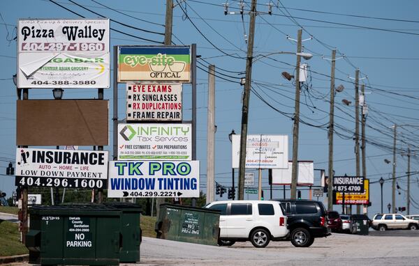 201001-Stone Mountain-Business signs line Memorial Drive in Stone Mountain. Ben Gray for the Atlanta Journal-Constitution