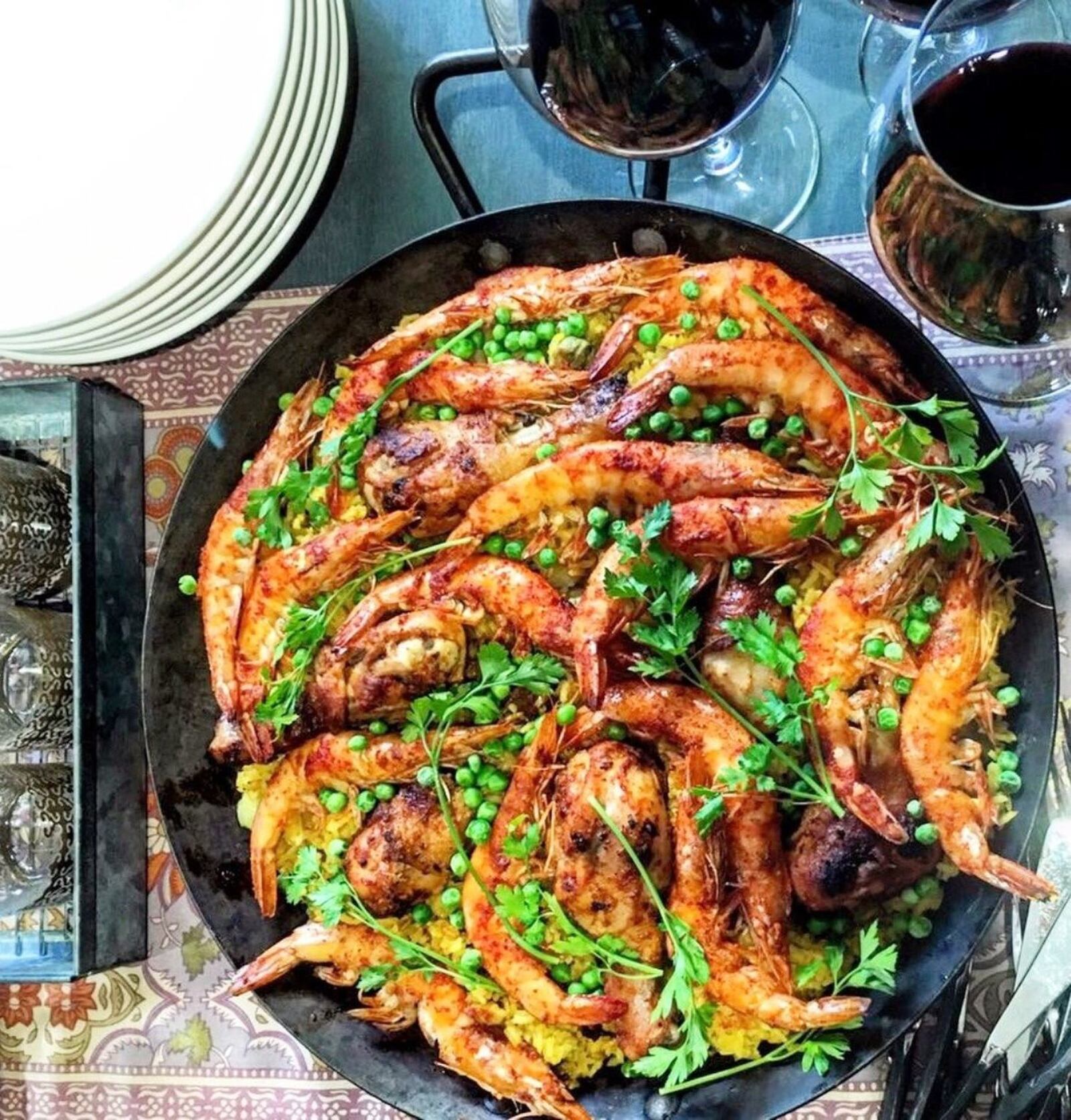 Though you can find a wonderful plate of paella in Spain, you also can create that magic at home by making Catalan Shrimp and Chicken Paella. CONTRIBUTED BY ASHA GOMEZ