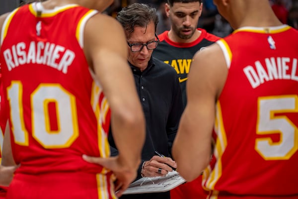 Atlanta Hawks head coach Quin Snyder sets the play during the first half of an NBA basketball game against the Los Angeles Clippers, Friday, March 14, 2025, in Atlanta. (AP Photo/Erik Rank)