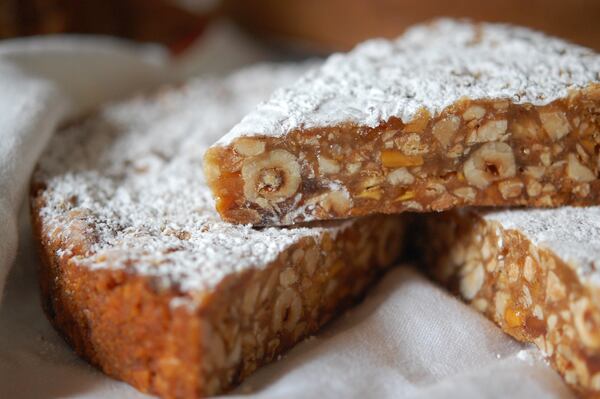 Panforte is a sticky fruitcake that hails from Siena, Italy. It's beloved during the Christmas season.
(Meridith Ford for The Atlanta Journal-Constitution)