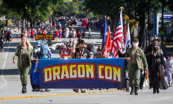 The start of the Dragon Con Parade heads up Peachtree Street on Saturday, September 4, 2021, in Atlanta. STEVE SCHAEFER FOR THE ATLANTA JOURNAL-CONSTITUTION