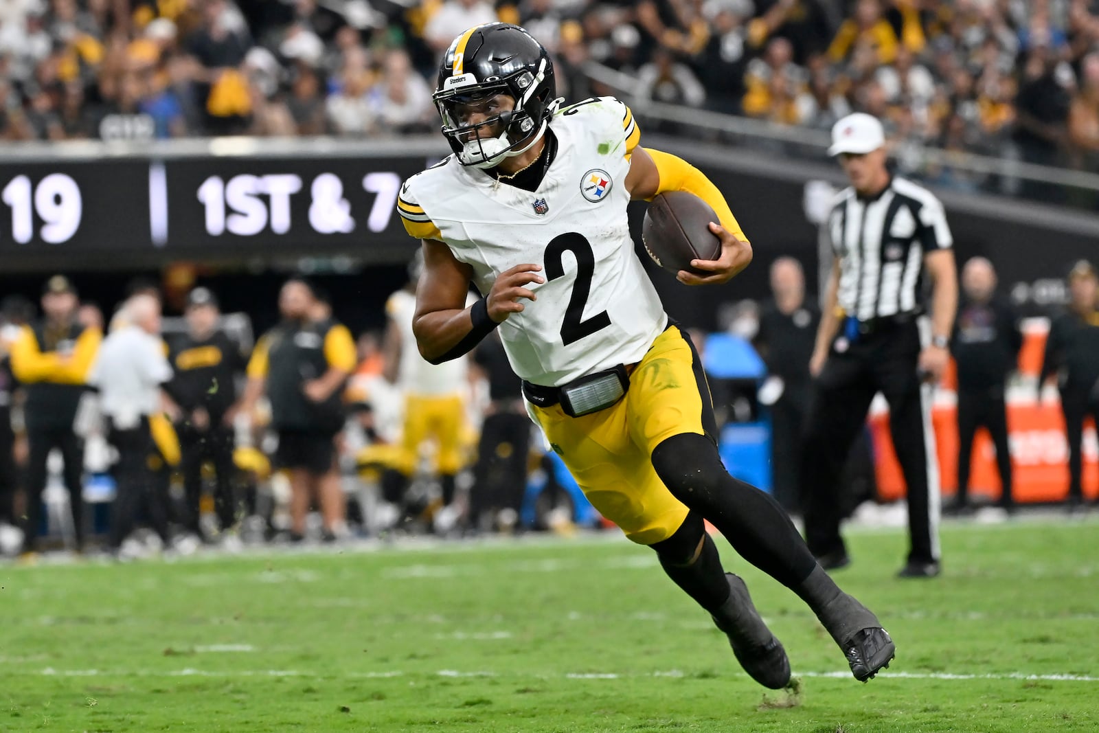 Pittsburgh Steelers quarterback Justin Fields (2) runs for a touchdown against the Las Vegas Raiders during the second half of an NFL football game in Las Vegas, Sunday, Oct. 13, 2024. (AP Photo/David Becker)