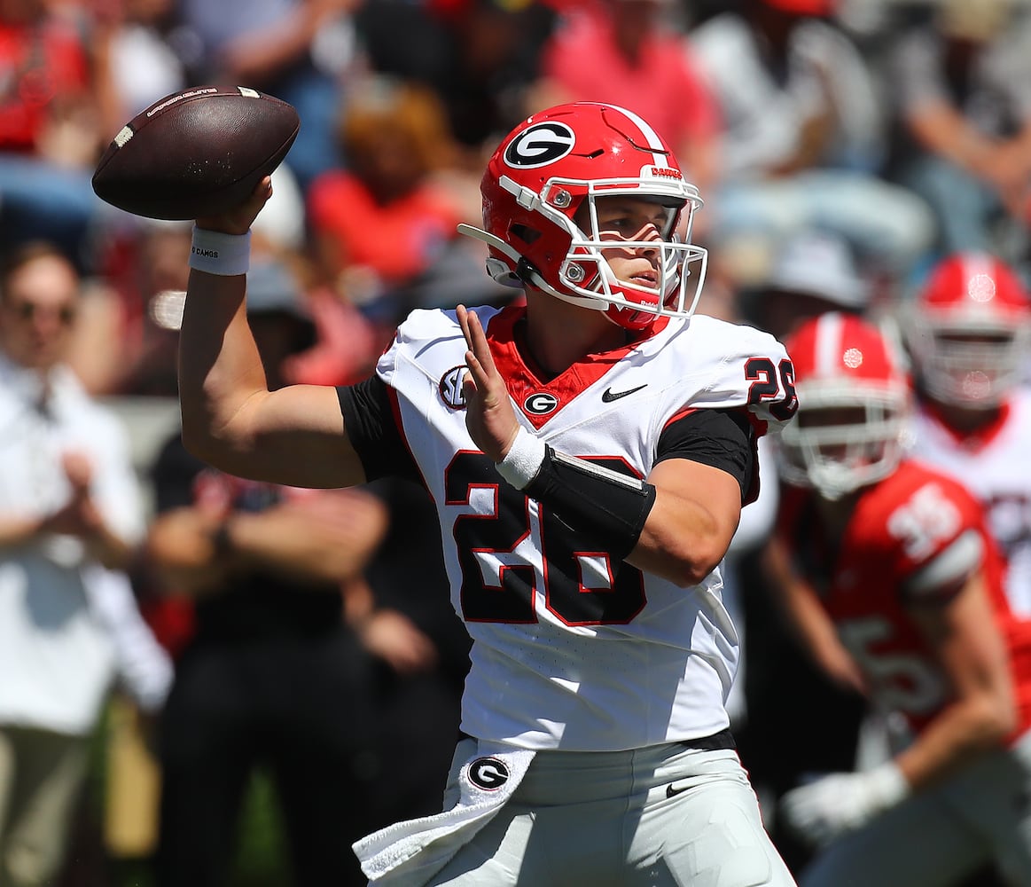 Quarterback Collin Drake throws a pass during the G-Day game on Saturday, April 13, 2024.  Curtis Compton for the Atlanta Journal Constitution