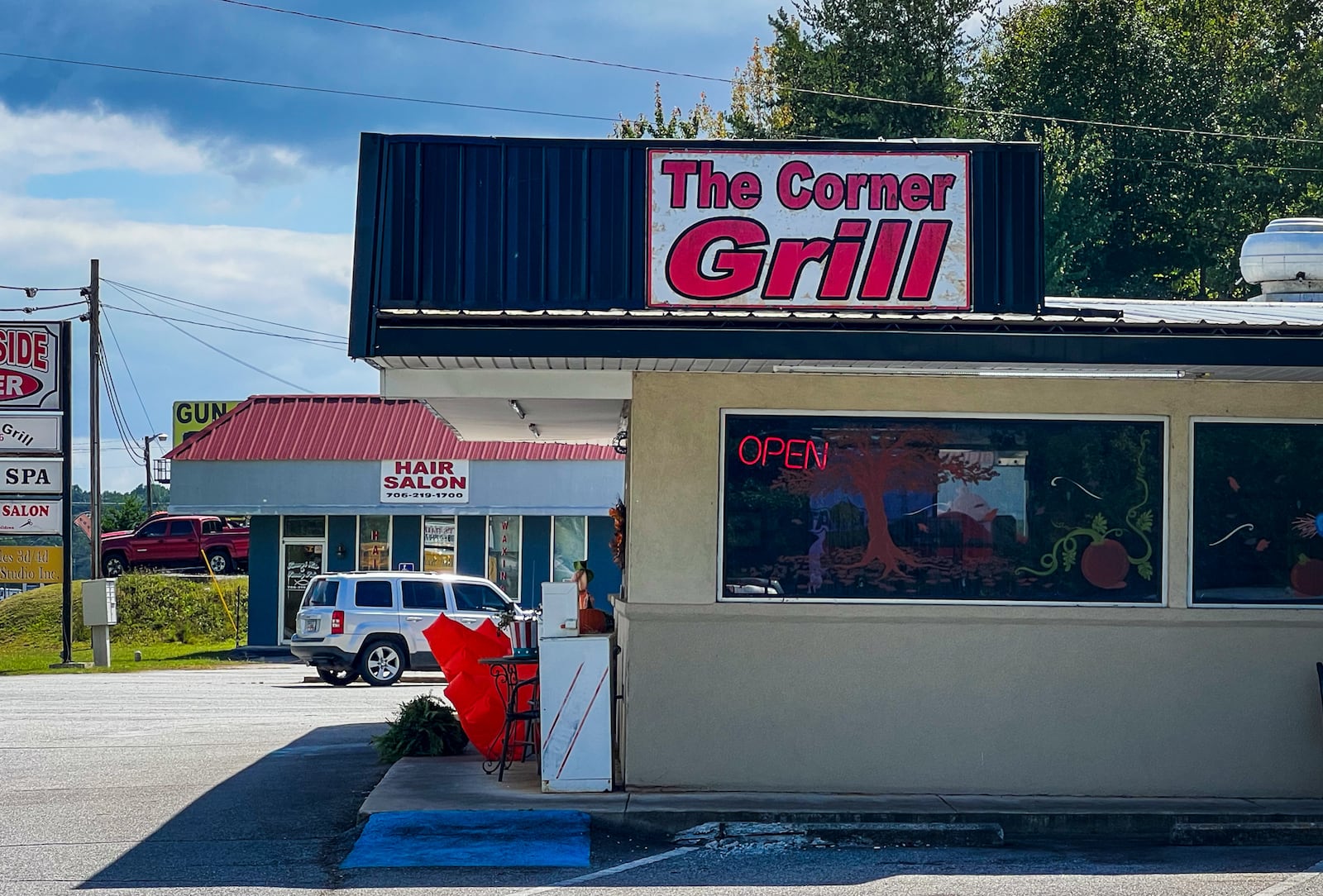 The lunch menu at the Corner Grill in Cleveland includes a long list of sandwiches, burgers and hot dogs, plus a whiteboard is covered in daily specials. (Henri Hollis/henri.hollis@ajc.com)