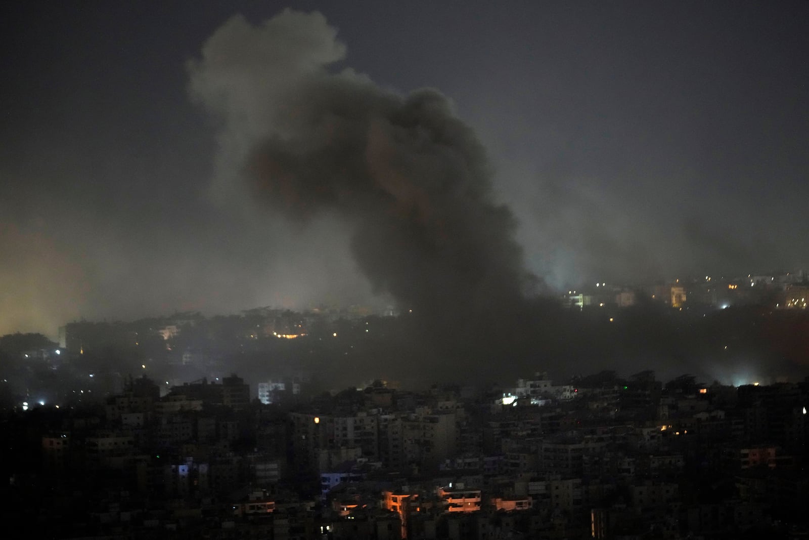 Smoke rises from Israeli airstrikes on Dahiyeh, in the southern suburb of Beirut, Lebanon, early Friday, Nov. 1, 2024. (AP Photo/Hussein Malla)