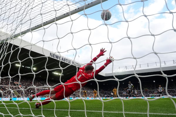 Newcastle United's Alexander Isak scores their side's first goal of the game from a penalty during the FA Cup fifth round match between Newcastle United and Brighton and Hove Albion at St James' Park, Newcastle, England, Sunday, March 2, 2025. (Owen Humphreys/PA via AP)