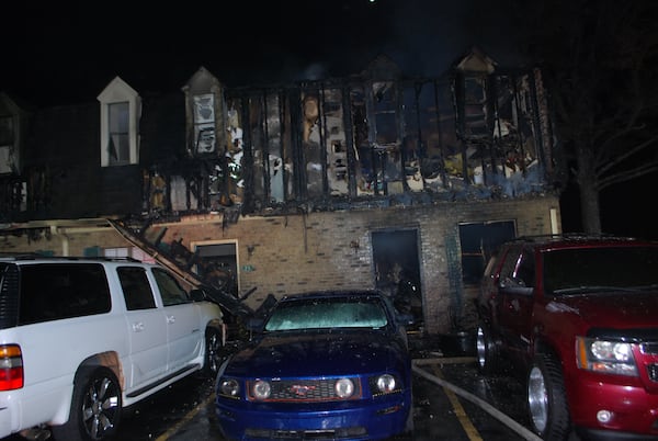 Seventeen adults and 10 children were displaced after a fire Wednesday morning at the Castlegate Townhomes near Buford. (Credit: Gwinnett County Department of Fire and Emergency Services )