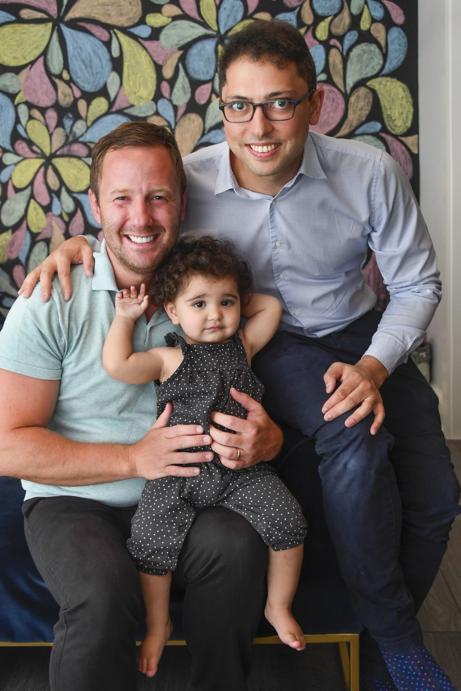 Simone and her fathers, Derek Mize and Jonathan Gregg.