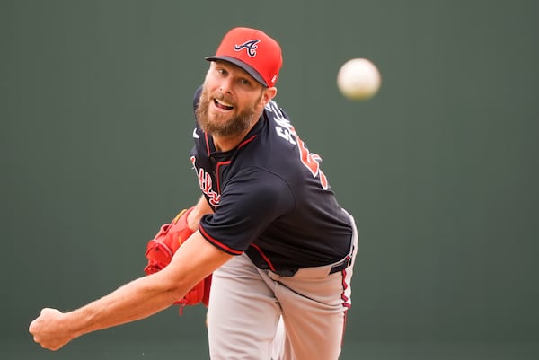 Atlanta Braves pitcher Chris Sale throws in the first inning of a spring training baseball game against the Minnesota Twins in Fort Myers, Fla., Saturday, Feb. 22, 2025. (AP Photo/Gerald Herbert)