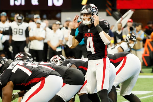 Falcons quarterback Desmond Ridder (4) react during the fourth quarter against the Jacksonville Jaguars on Saturday, August 27, 2022, at the Mercedes-Benz Stadium in Atlanta, Ga.  Miguel Martinez / miguel.martinezjimenez@ajc.com