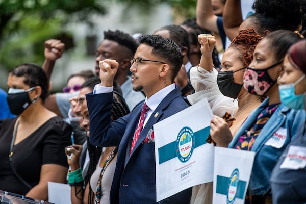 Atlanta City Councilman Antonio Brown poses for photo a with his supporters following a press conference where he announced his bid for mayor of Atlanta on Friday, May 14, 2021. (Alyssa Pointer / Alyssa.Pointer@ajc.com)