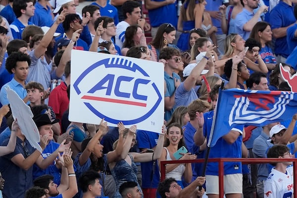 FILE - Fans in the SMU student section hold up a sign during the first half of an NCAA college football game against Florida State, Saturday, Sept. 28, 2024, in Dallas. (AP Photo/LM Otero, File)