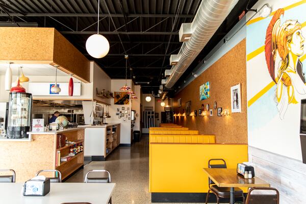 The interior of The Greek Pizzeria and Gyros in Brookhaven has a retro modern look. (Mia Yakel for The Atlanta Journal-Constitution)