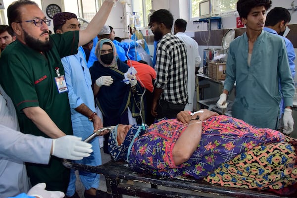 An injured victim of bomb explosion at railway station, is treated at a hospital, in Quetta, southwestern Pakistan, Saturday, Nov. 9, 2024. (AP Photo/Arshad Butt)