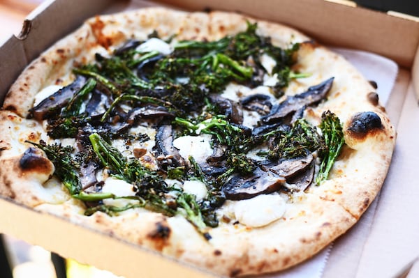 You can get a hearty, vegetarian pizza from Forno Vero at Marietta Square Market. Henri Hollis/henri.hollis@ajc.com