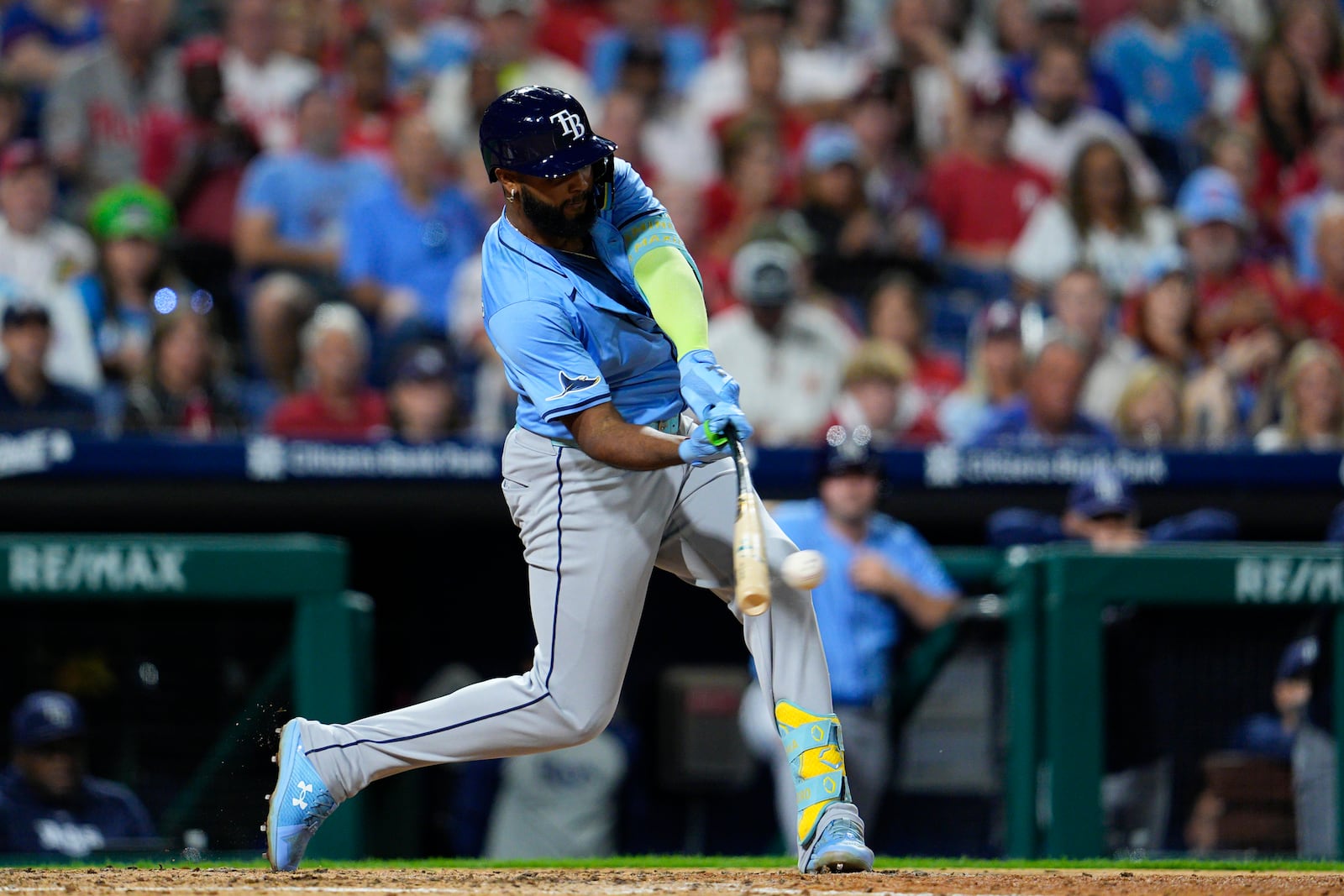 Tampa Bay Rays' Junior Caminero hits an RBI single off Philadelphia Phillies' Ranger Suarez during the fifth inning of a baseball game, Tuesday, Sept. 10, 2024, in Philadelphia. (AP Photo/Derik Hamilton)