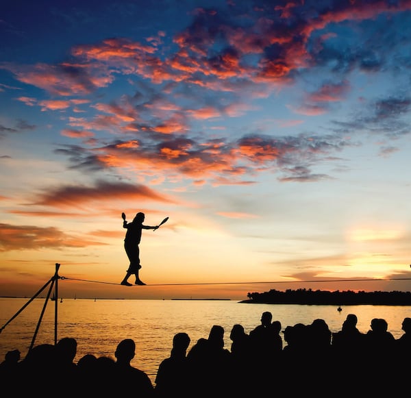 Will Soto performs a juggling and high-wire act at the Sunset Celebration at Mallory Square in Key West. ROB O’NEAL / FLORIDA KEYS NEWS BUREAU